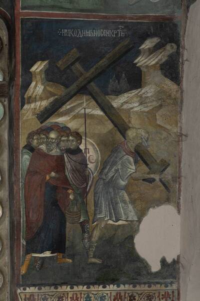 Nicodemus carries the cross