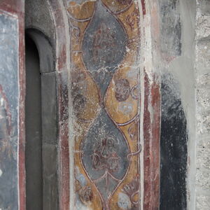 Ornament in window on the north wall of the western Bay